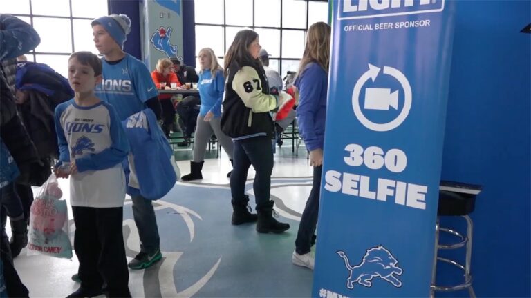 lions fans at 360 photo booth