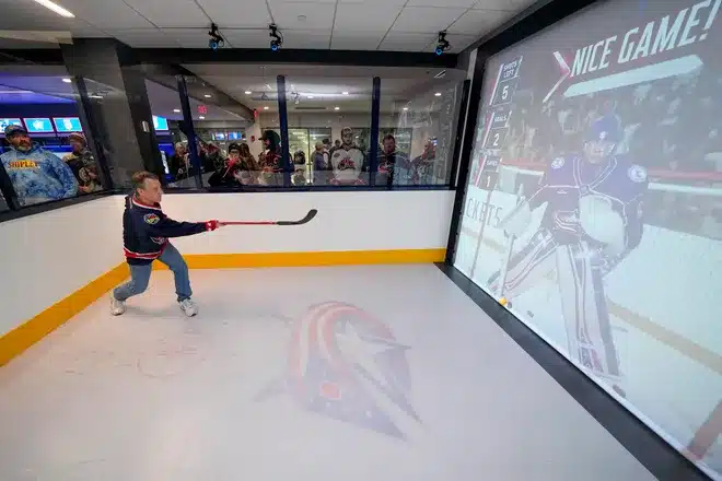 hockey fan zone puck shot